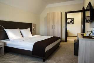 Отель Hotel Antonio Conference Бжег Апартаменты с 2 спальнями-1